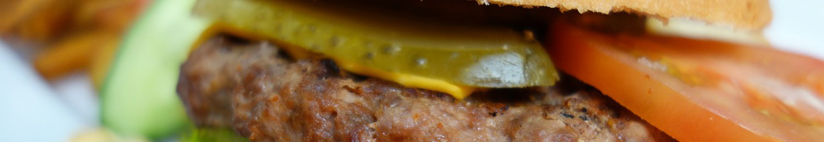Eating Burger Fast Food at Mytiburger restaurant in Houston, TX.
